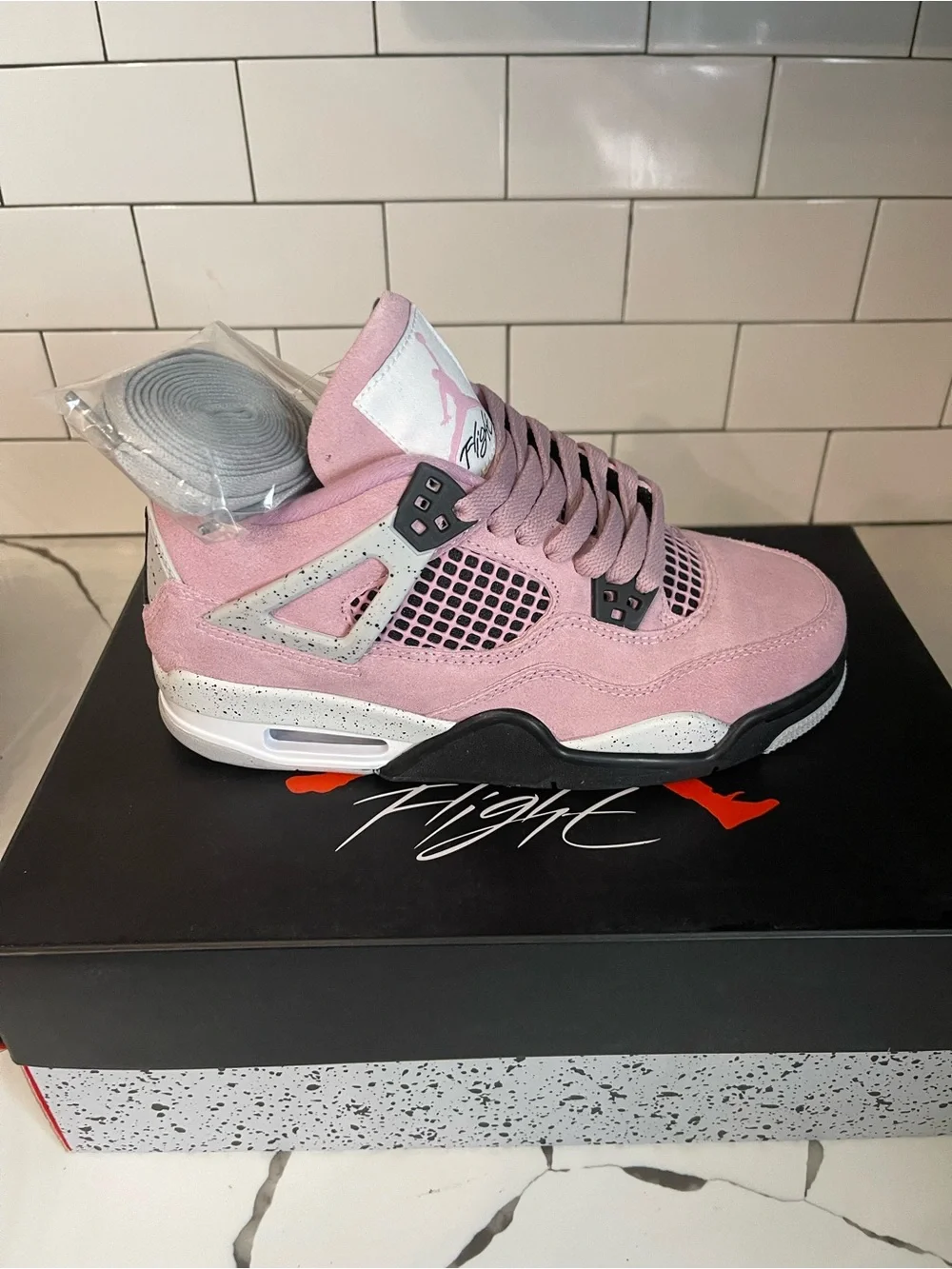 Men’s Retro 4 Pink Orchid Size 7.